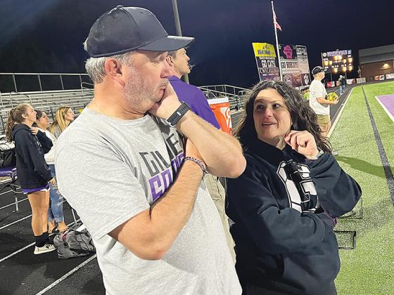 Above are former Gilmer High soccer head coaches Simon Phipps and April Nicholson discussing strategy this past season. (Contributed photo by Greg Withrow)