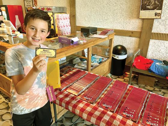 Dane Spilberg shows the golden ticket, that makes him an honorary grand marshal in Ellijay’s upcoming July Fourth parade. 