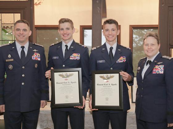 George and Noah Powell, cadet colonels in Ellijay’s 507th Civil Air Patrol Composite Squadron, center, accept the prestigious Spaatz Award from CAP National Commander/CEO Maj. Gen. Edward Phelka, left, and National Vice Commander Brig. Gen. Regena Aye, right.
