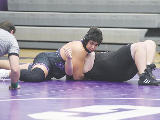 Gilmer High alum Tony Olea is moments away from pinning his opponent last season, and the All-American will make his way to Emmanuel College to wrestle for the Lions. 
