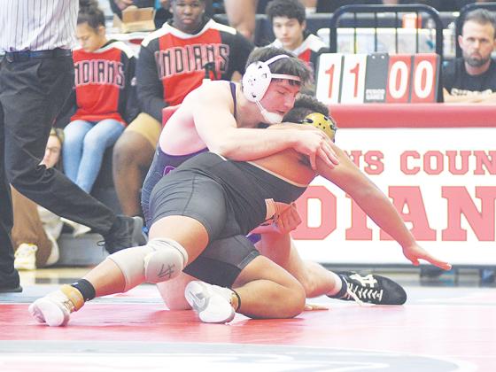 Dylan Galloway gains control of his opponent during his senior season at GHS and will take the mat for the Life University Running Eagles next season.