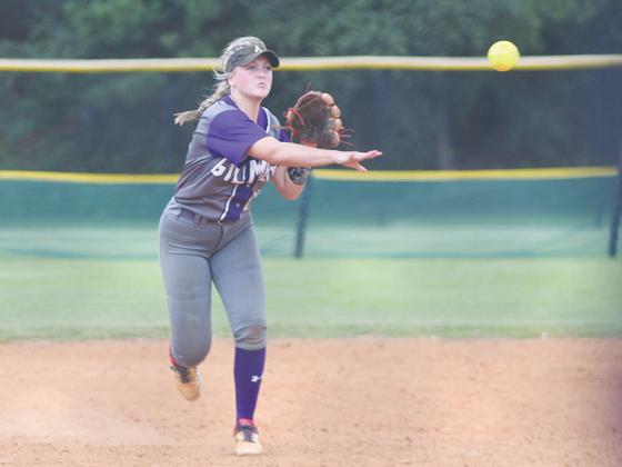 Gilmer senior shortstop Macy Hamby throws to first, and she accounted for the Lady Cats’ only hit versus Wesleyan, which was a solo home run.