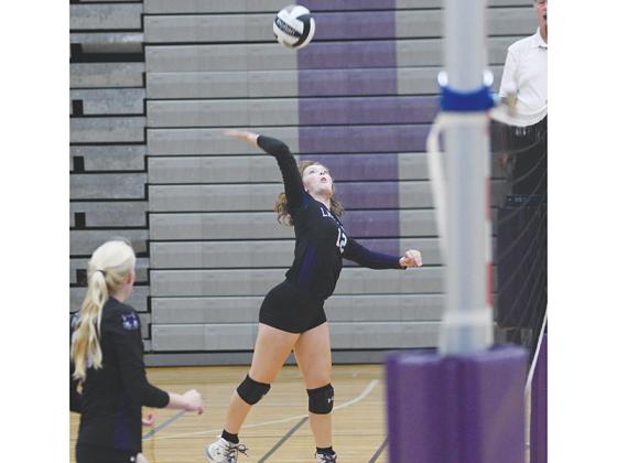 Gilmer High senior hitter Brooke Wilson looks to score a point for the Lady Cats earlier this season.