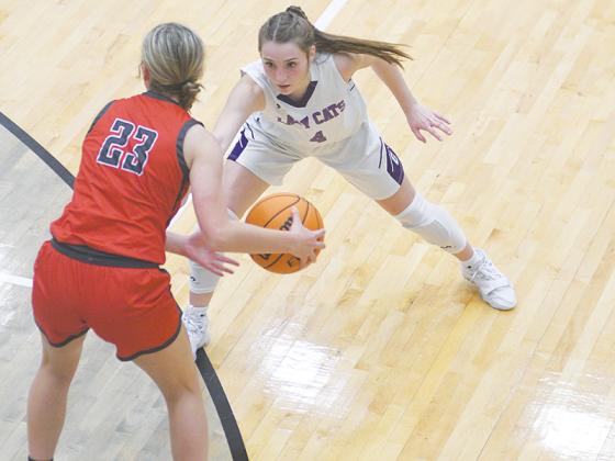 Gilmer Lady Cat Aliza Chastain applies defensive pressure and led GHS with 14 points in its season opener versus Copper Basin.