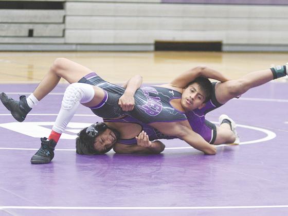 Gilmer’s Juan Rafael (in black) returns this season as the reigning 106-pound Class 3A state champion. He posted a 4-0 record at the Denmark Dane Duals last Saturday.