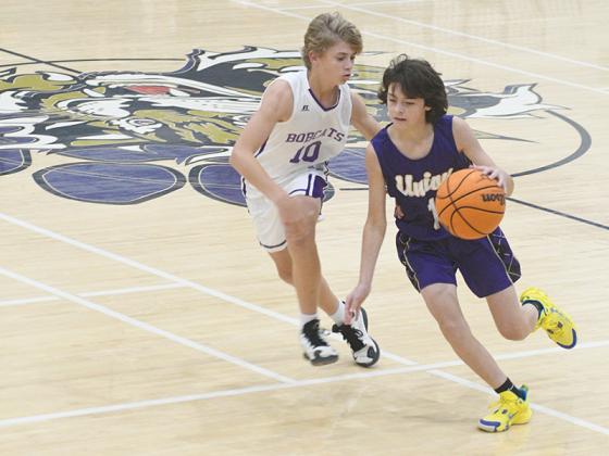 Clear Creek eighth grader Mason West defends the perimeter.