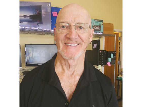 Vietnam veteran Ray Postell in the Ellijay shop he owns and operates, North Georgia Computer Brokers.