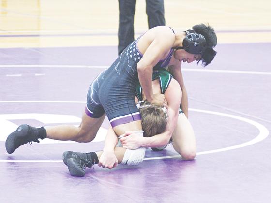 Gilmer High School wrestlers Leo Domingo, above, and Carson Farist, below. The duo took first in the 113- and 126-pound weight classes, respectively, at last week’s Garvin Edward’s Hall of Fame Classic in Rome. 