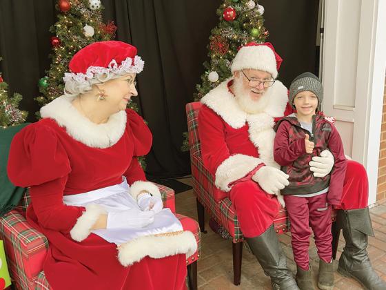 Santa and Mrs. Claus were at the courthouse for photos and reading "Twas the Night Before Christmas"