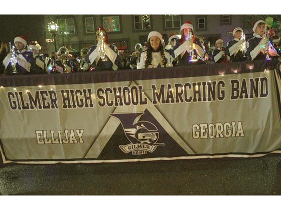 The Gilmer High School marching band ushered in the parade