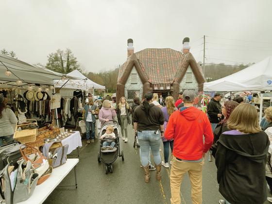 Crowds came to enjoy the festive atmosphere despite gray skies and precipitation