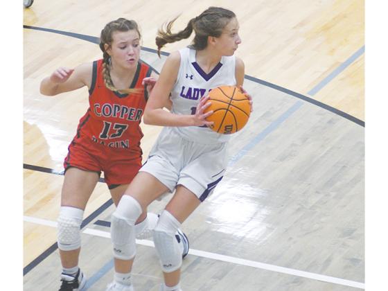 Lady Cat Madison Bradshaw gathers a rebound and had nine to go with 10 points in Gilmer’s latest matchup versus North Murray.