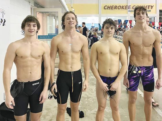 From left are Gilmer High School swimmers Larz Fowler, Law Lykins, Jacob Kucera and Ian Berry who qualified for the state meet in the 400-yard freestyle relay at last Saturday’s Water Warrior Invitational. The Bobcats have also qualified for the 200 free relay, and Lykins has achieved state qualifying times in the 50 and 100 freestyle, as well as the 100-yard butterfly.