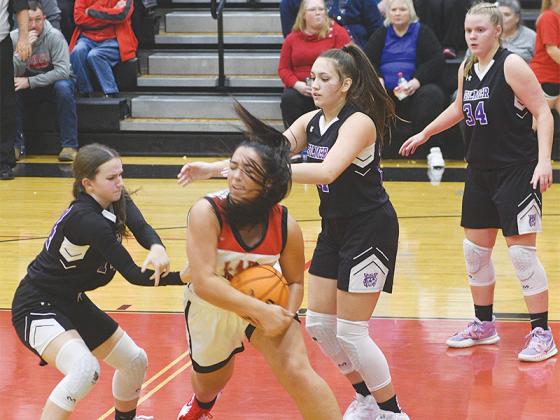 Lady Cats defend the post