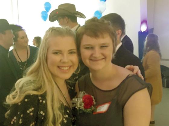 Deanna Carter, right, and buddy Emily Hall enjoy the first Night to Shine Prom held at Cartecay Baptist Church in 2020.