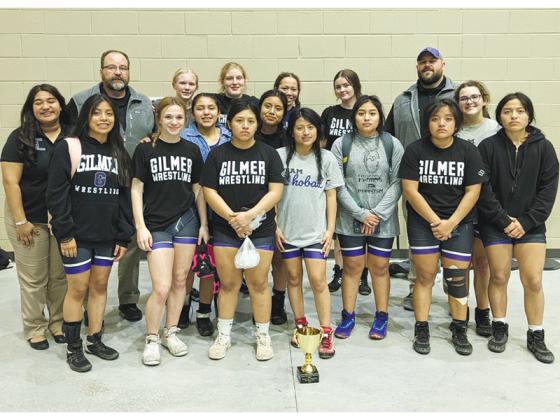 Above are Gilmer High coaches and wrestlers following the first-ever girls duals wrestling state tournament last Friday. GHS was one of eight teams in attendance and posted a 2-2 record for fourth place. 