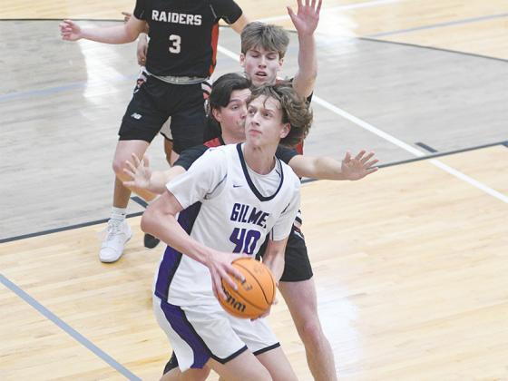 Gilmer sophomore Jackson McVey faces a double team in the post versus Southeast Whitfield last Saturday. McVey scored 23 points and grabbed 18 rebounds in the Bobcats’ three-point win