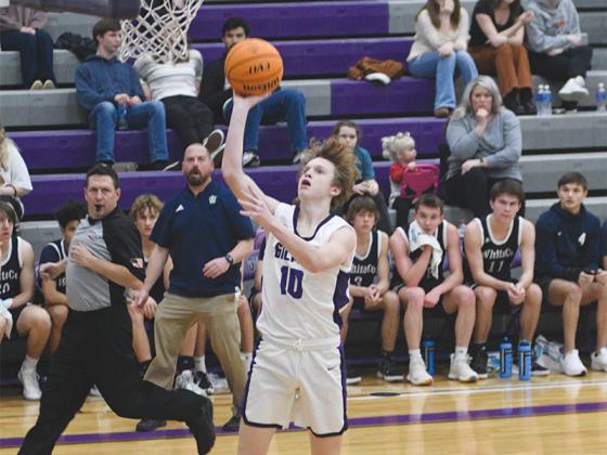 Gilmer’s J.D. Taylor scores two transition points following a steal versus White County last Tuesday. 