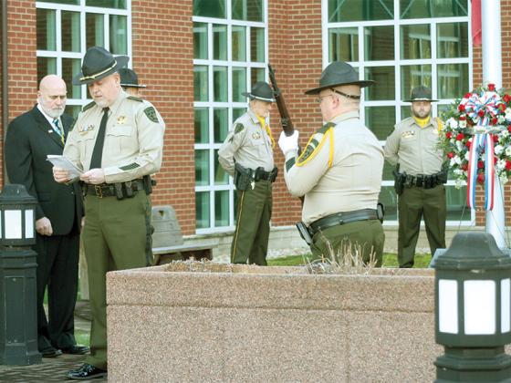 Sheriff Stacy Nicholson reads an inspirational passage by Chuck Bowman, an Oregon fire and police chaplain, that recognizes the sacrifices made by police officers who’ve died in the line of duty. Dickey was killed while serving a warrant on a fleeing fugitive Feb. 13 1996. The memorial service has become an annual tradition for the sheriff’s office. “We never forget and we know the family never forgets. There’s really not a day that goes by that we don’t remember Brett,” said Nicholson.