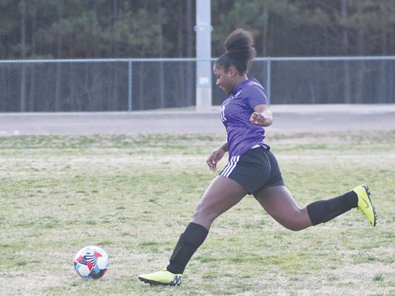 Gilmer’s Amayah Jones dribbles down field last Tuesday and scored the winning goal against Adairsville.