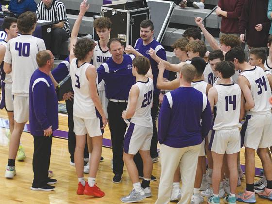 Head coach Jordan Hice and the Bobcats discuss strategy during a fourth-quarter timeout versus Hart County last Wednesday.