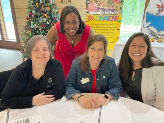 Georgia Family Connection Regional Manager Gabrielle Stewart, back, collaborates with Family Connection directors of Gilmer, Pickens and Fannin County during the first Journey to Action event at the Craddock Center. In front, from left: Sherry Morris (Fannin), Jacque Elwarner (Pickens) and Tiffany Watson (Gilmer). 