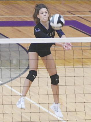 Gilmer High Lady Cats Abbie Elliott (above) and Lilyan Cook (below) during Monday’s match against the Christian Heritage Lions.