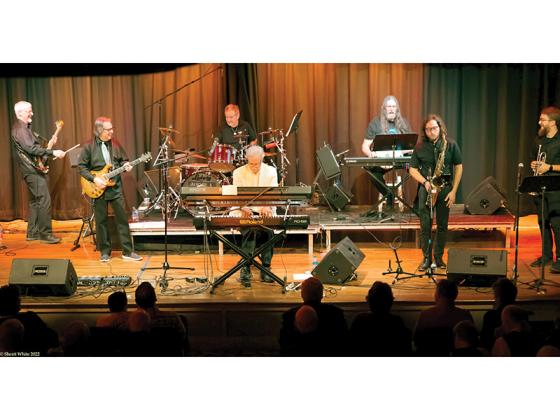 The Kool Breeze Band, led by Jim Richter, specializes in a danceable blend of jazz fusion music. The latest addition to the eight-piece band is Gilmer County percussionist Nathan Talbot, below. 