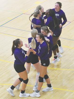 The Gilmer High Lady Cats celebrate their first win of the season versus Trion last Saturday.