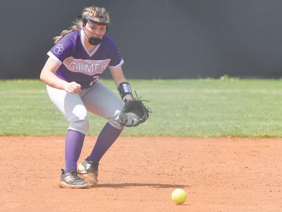 Gilmer Lady Cat third baseman Gracie Morrow gets in position to field a ground ball.