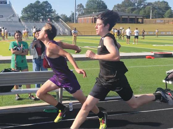 Gilmer High freshman Dawson Richard narrowly wins last week’s 5K at North Murray.