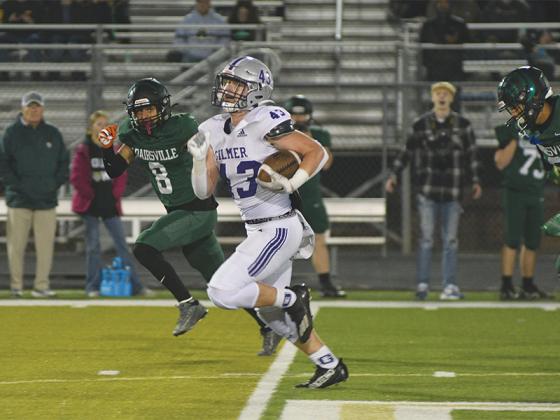 Gilmer High School freshman halfback Douglas Callihan breaks free for a 60-yard touchdown run in the Bobcats’ 35-28 victory versus Adairsville last Friday. The win was the Cats’ first playoff victory in 10 seasons. See story in Sports.