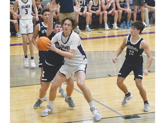 Gilmer High School’s Jackson McVey makes moves in the post last season. He has been named to three preseason all-state lists and received a pair of scholarship offers ahead of his junior season.