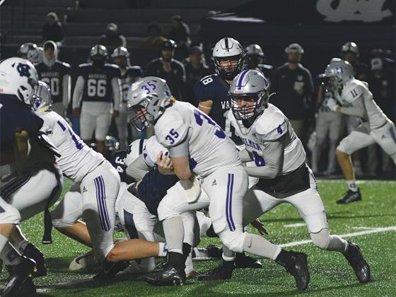 Gilmer High quarterback Issac Rellinger (4) and fullback Wyatt Stokes (35) rushed for 87 and 69 yards, respectively, versus White County last Friday.