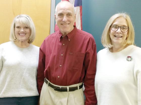 Outgoing Ellijay City Councilmembers Sandy Ott, left, and Katie Lancey, right, are pictured with Mayor Al Hoyle following their last council meeting.