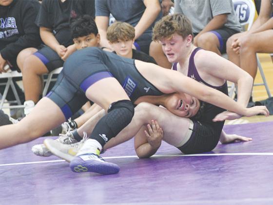 Keigan Brookshire takes down his opponent.