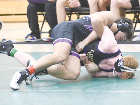 Gilmer senior Carson Farist turns his Lumpkin County opponent for a pin last Saturday.