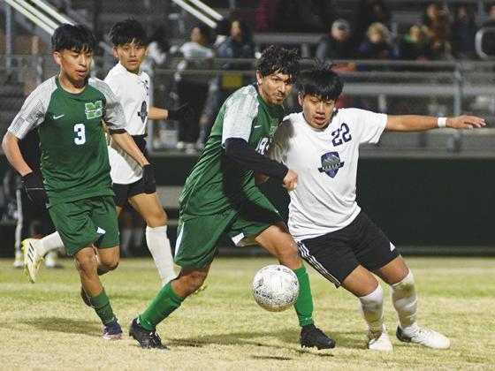 Gilmer’s Angel Garcia (22) curled the ball into the goal while taking a corner kick versus Fannin County last Monday.