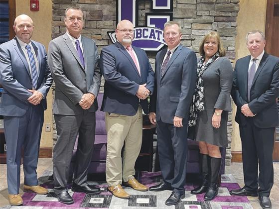 From left are, new vice chairman Jacob Callihan and chairman Michael Parks, superintendent Dr. Brian Ridley and fellow board members Doug Pritchett, Michele Penland and Joe Pflueger. 