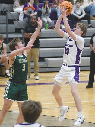 Gilmer’s J.D. Taylor makes a jump shot for the Bobcats versus Wesleyan last Friday. 