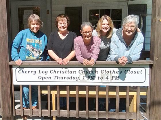 From left, volunteers Sally Dowling, Betty Turcan, Adrianna Ernst, Emmie Lee and Cathy Vincent are shown at the Cherry Log Christian Church Clothes Closet, which will add Saturdays to its operating schedule starting April 6. 