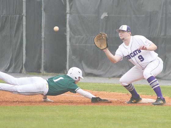 Gilmer senior Dalton Crisp prepares to catch a pickoff attempt versus Wesleyan. He earned a complete game victory last Thursday, and over the course of the series, he collected four hits and drove in five runs offensively.