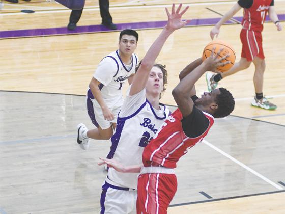 Gilmer all-state selection Jackson McVey defends the post during the Class 3A state tournament.