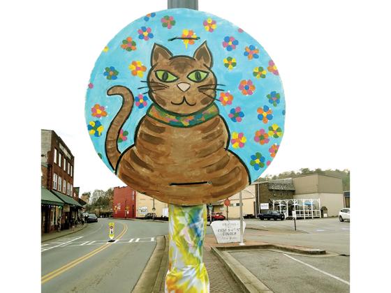 Animal-themed signs go up around downtown Ellijay prior to the Woofstock pet party presented by Friends of the Gilmer Animal Shelter. 