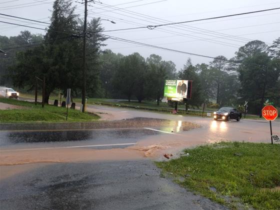 The intersection of Progress Road and Maddox Drive was almost under water during the storm last Thursday morning that raked Gilmer County with torrential rains and high winds. (Photo by Mark Millican)