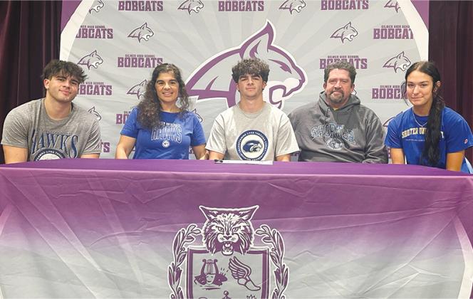 Gilmer High senior pitcher Austin Zabala, seated center, will attend Shorter University and play baseball for the Hawks. From left, he is joined by brother Blake Zabala, parents Maria and Albert Zabala and girlfriend Hailey Peed.