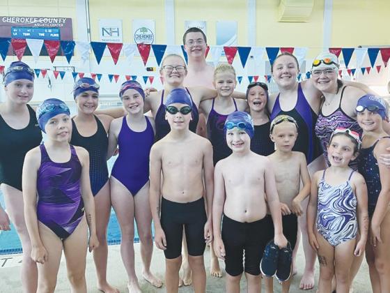 Above are members of the Gilmer Swim team prior to their first meet of the summer at the Cherokee Aquatic Center.
