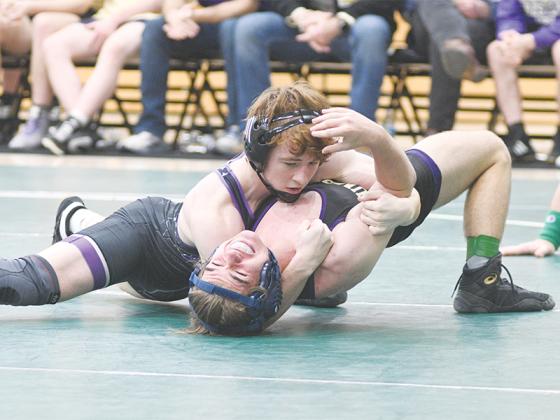 Gilmer’s Bregan Berry is set to attend Reinhardt University and wrestle for the Eagles. Above, Berry is in the process of securing a win his senior season en route to an individual state championship.