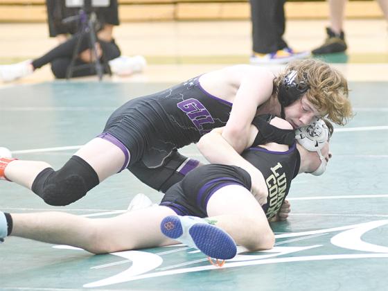 Bobcat Braelyn Nelson controls his opponent last season and had perfect attendance during Gilmer High’s four weeks of practices and matches in June.