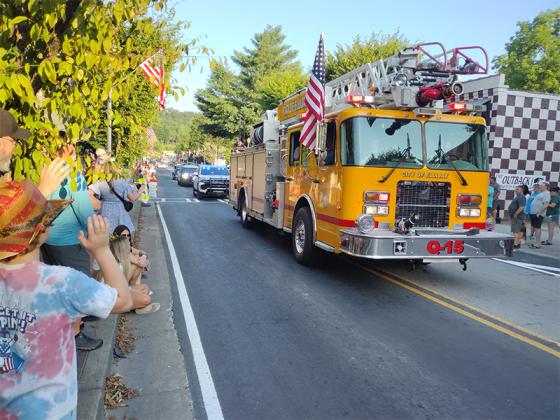 Everyone loves a fire truck in a July 4 parade, and both the Ellijay and Gilmer County Fire Departments were glad to oblige. (Photo by Mark Millican)